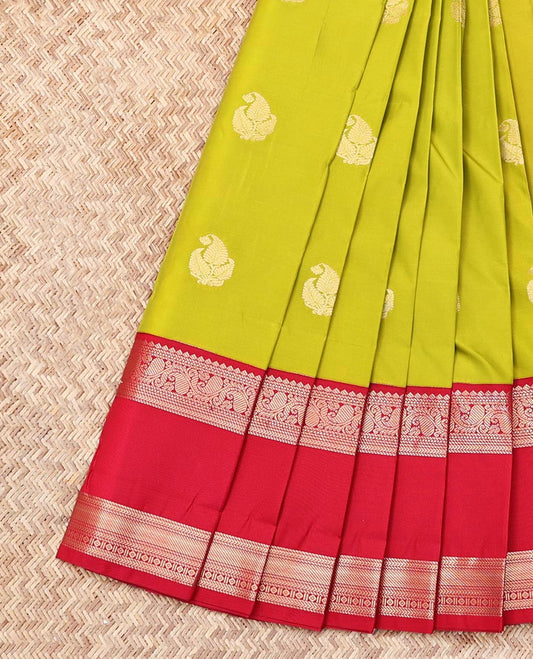 Green Budget Silk Saree, Subtly Sparkled with Zari Buttas, Complemented by a Contrast Traditional Zari Rettai Pettu Border, Jaal Pallu, and a Contrast Blouse