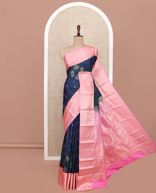 Blue Budget Silk Saree, Steeped in the Richness of Tree Buttas All Over Its Body, Complemented by a Contrast Traditional Zari Design Border, Boldly Accentuated Pallu, and Paired with a Contrast Blouse