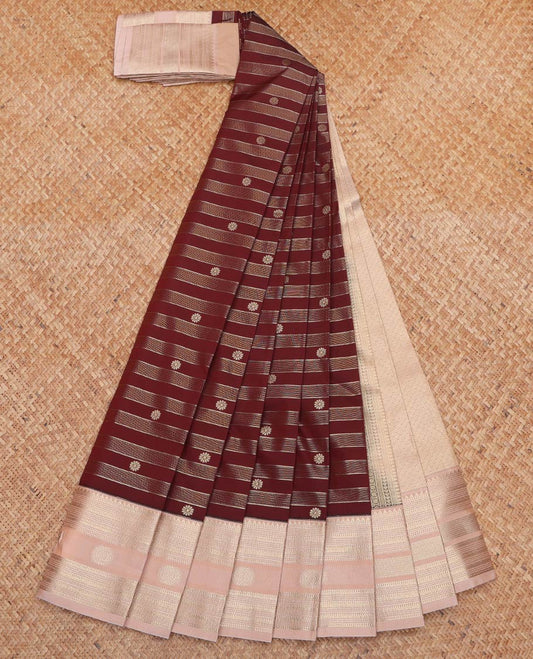 Brown Budget Silk Saree, Artfully Designed with Zari Buttas and Stripes All Over Its Body, Complemented by Contrast Traditional Zari Designs Woven Border, Grand Jaal Pallu and Paired with a Contrast Blouse