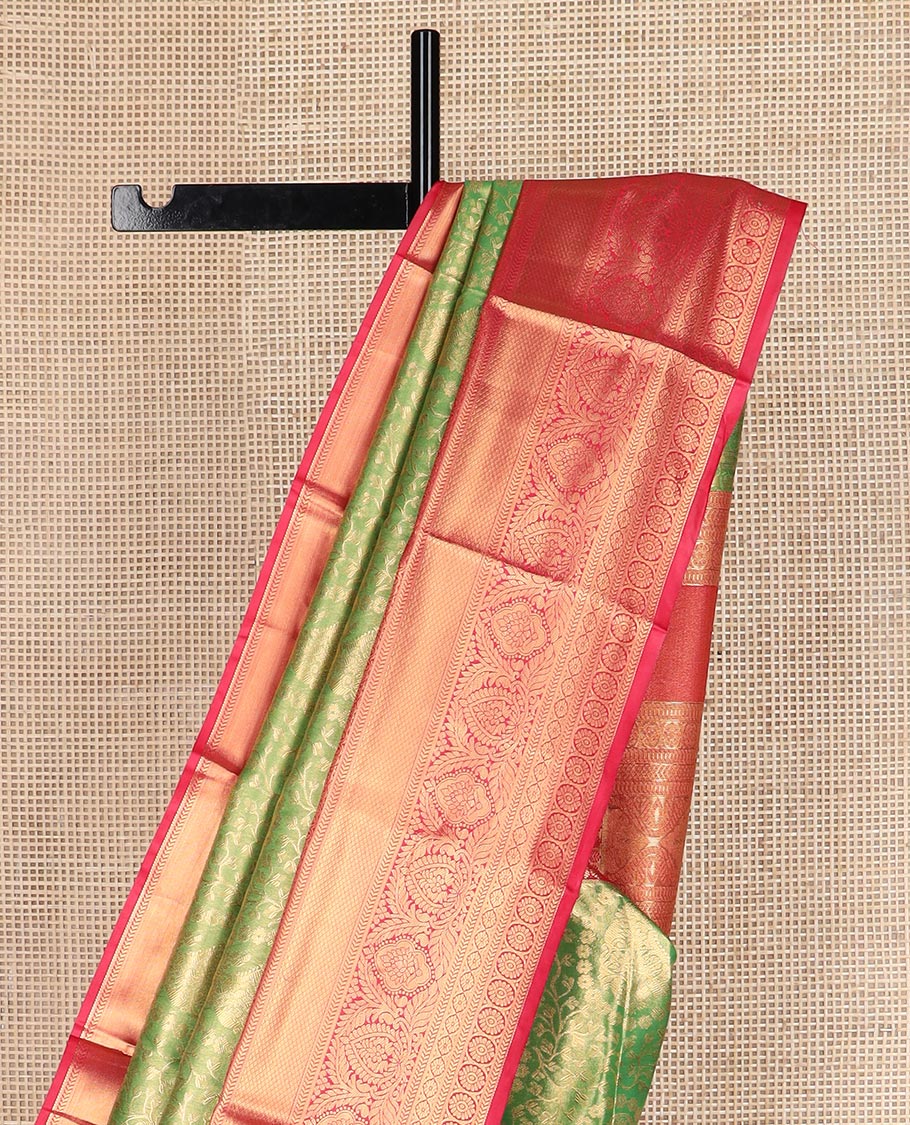 Green floral jacquard budget silk saree, contrast traditional zari border, and intricate zari woven pallu