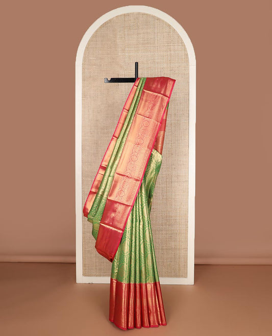 Green floral jacquard budget silk saree, contrast traditional zari border, and intricate zari woven pallu