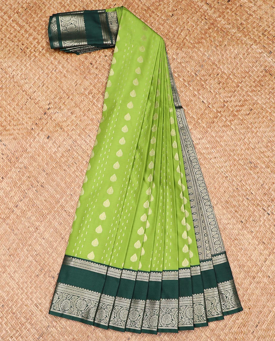Green zari buttas gift saree, contrast rettai pettu zari border, and pallu steeped with traditional designs