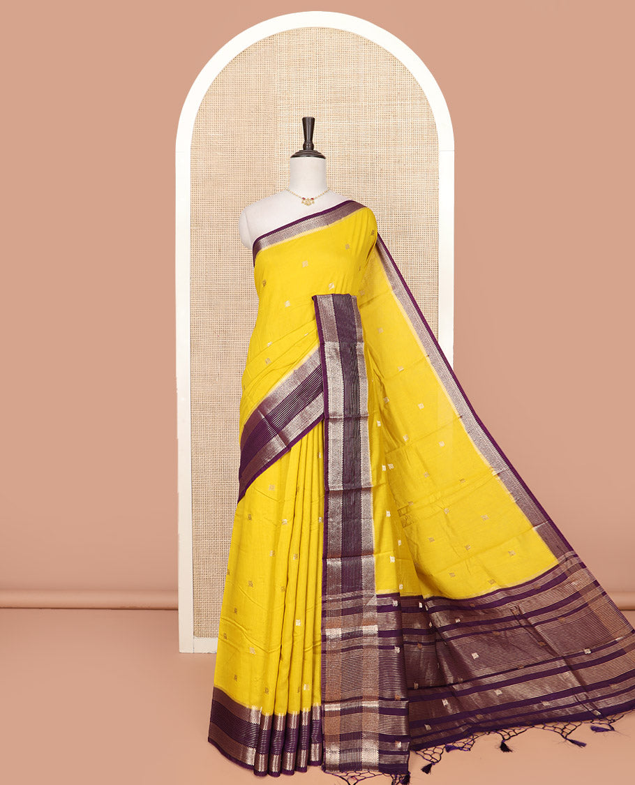 Yellow Assam Silk Saree Sparsely Woven with Peacock Buttas, Complemented by Contrast Traditional Zari Design Border, Pallu Highlighted with Zari Stripes, and Paired with a Contrast Blouse