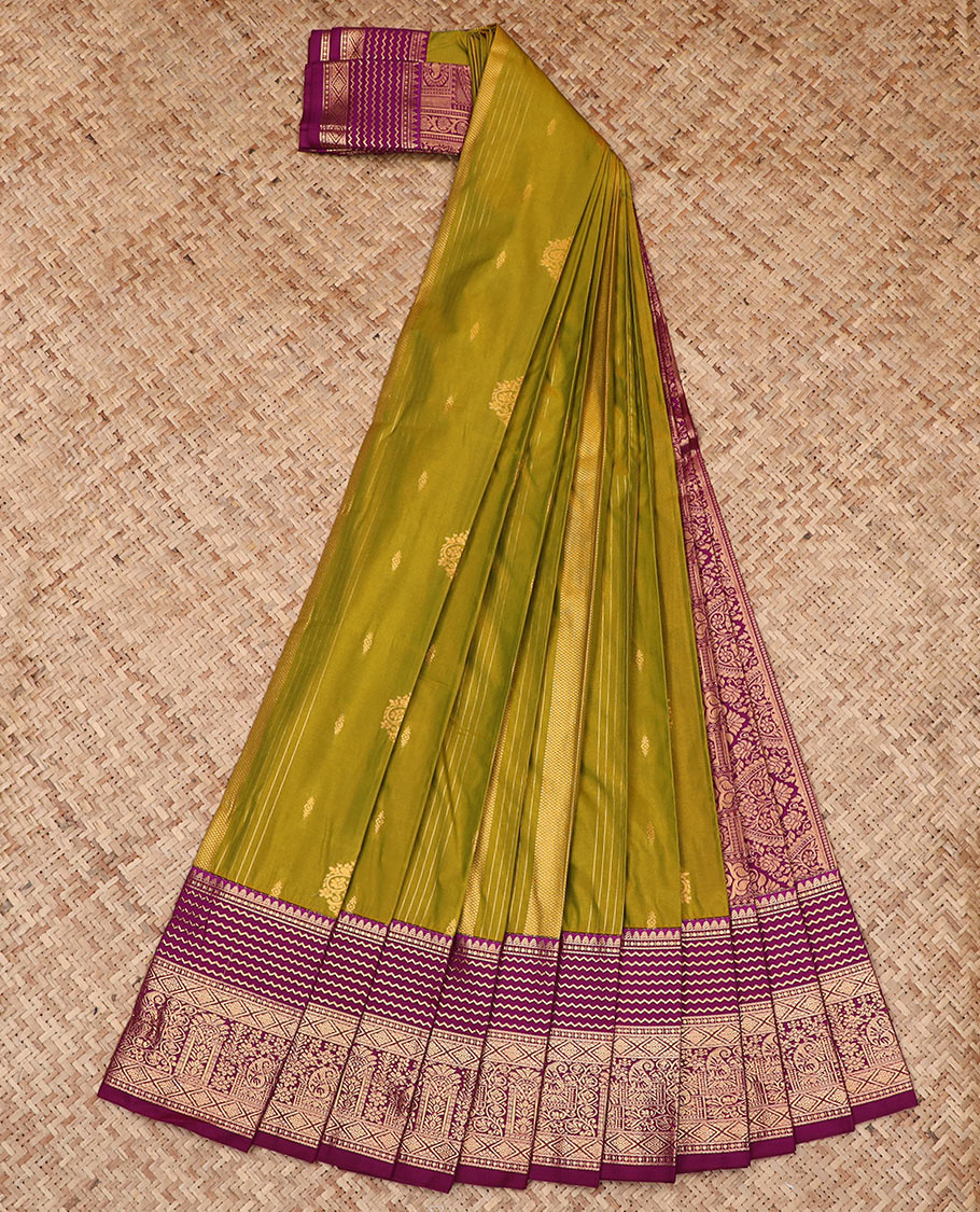 Green Budget Silk Saree Beautified with Zari Buttas, Highlighted with a Contrast Traditional Zari Border, Elevated with Pallu of Thilak and Jaal Designs, Paired with a Contrast Blouse