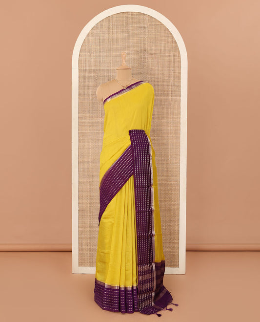 Yellow plain Assam silk saree, contrast traditional design border, and pallu of stripes