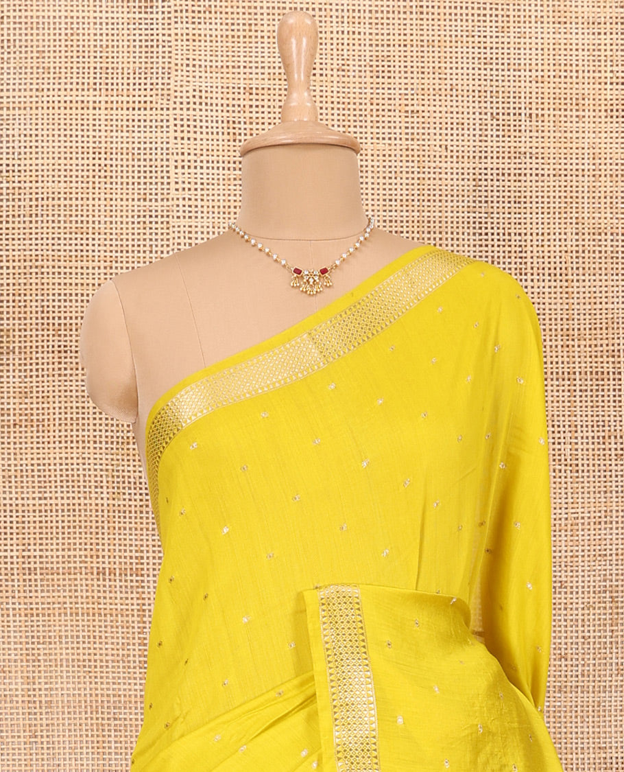 Bright Yellow Assam Silk Saree Woven with Buttas, Subtly Woven Traditional Zari Border, Pallu Trimmed with Zari Stripes, and Paired with a Contrast Blouse