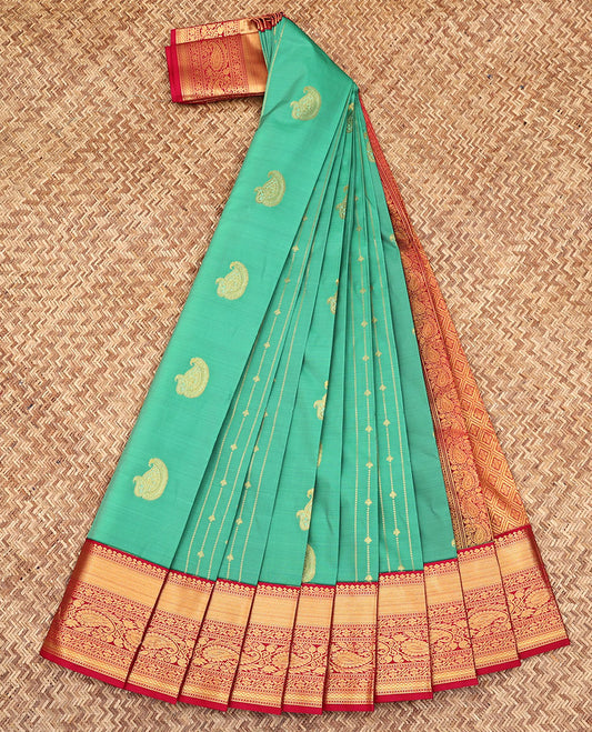 Green Budget Silk Saree, Delicately Woven with Paisley Buttas and Stripes All Over Its Body, Complemented by a Contrast Traditional Zari Design Border, Grandly Jaal-Design Pallu, and Paired with a Contrast Blouse