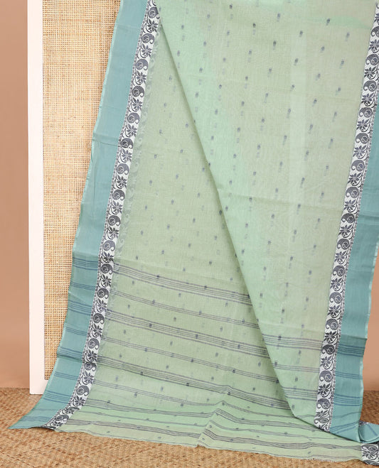 Pale green buttas Bengal cotton saree, contrast paisley creeper border, and pallu of stripes, and buttas
