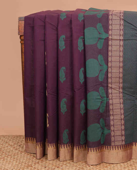 Maroon buttas kanchi cotton saree, contrast temple border, and pallu of paisley and geometric designs