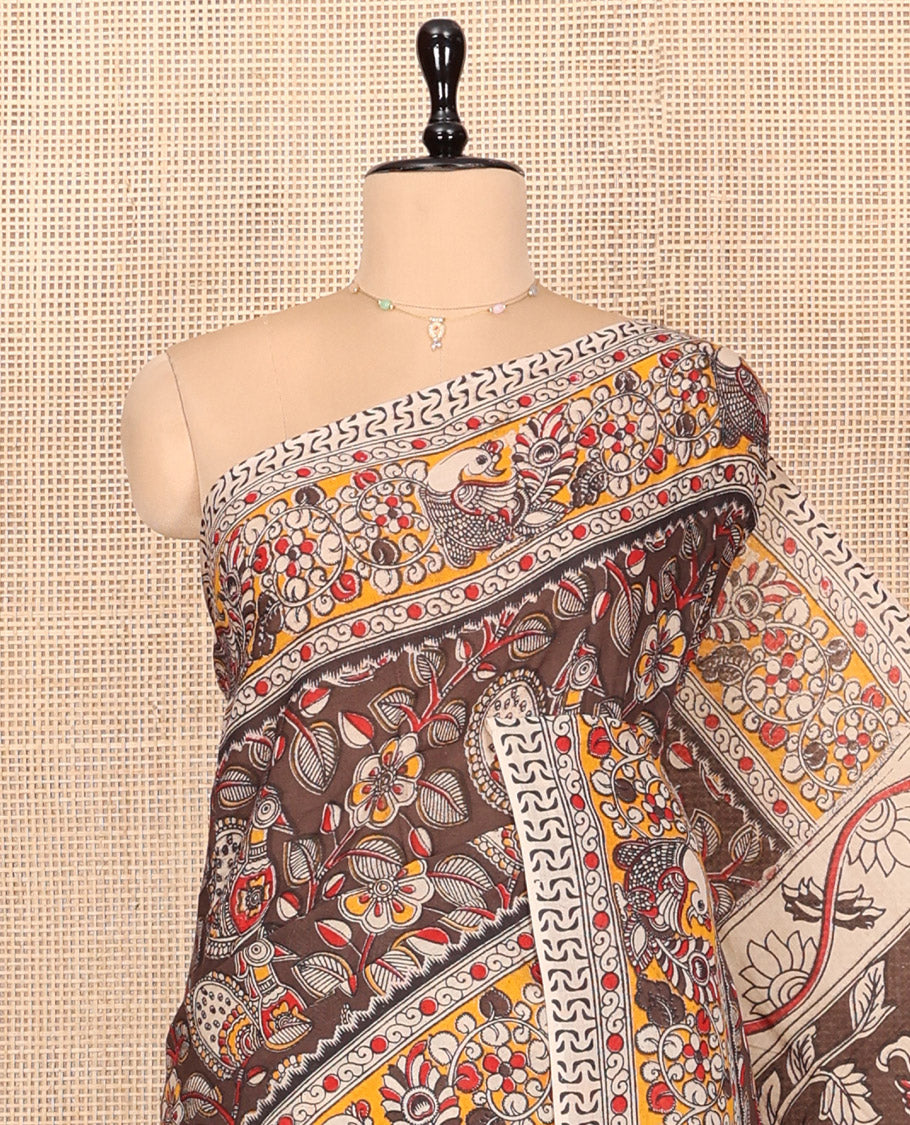 Brown Kalamkari Cotton Saree, Accentuated with Floral Print, Contrast Floral-Peacock Border, Pallu of Peacock Print, and a Contrast Blouse