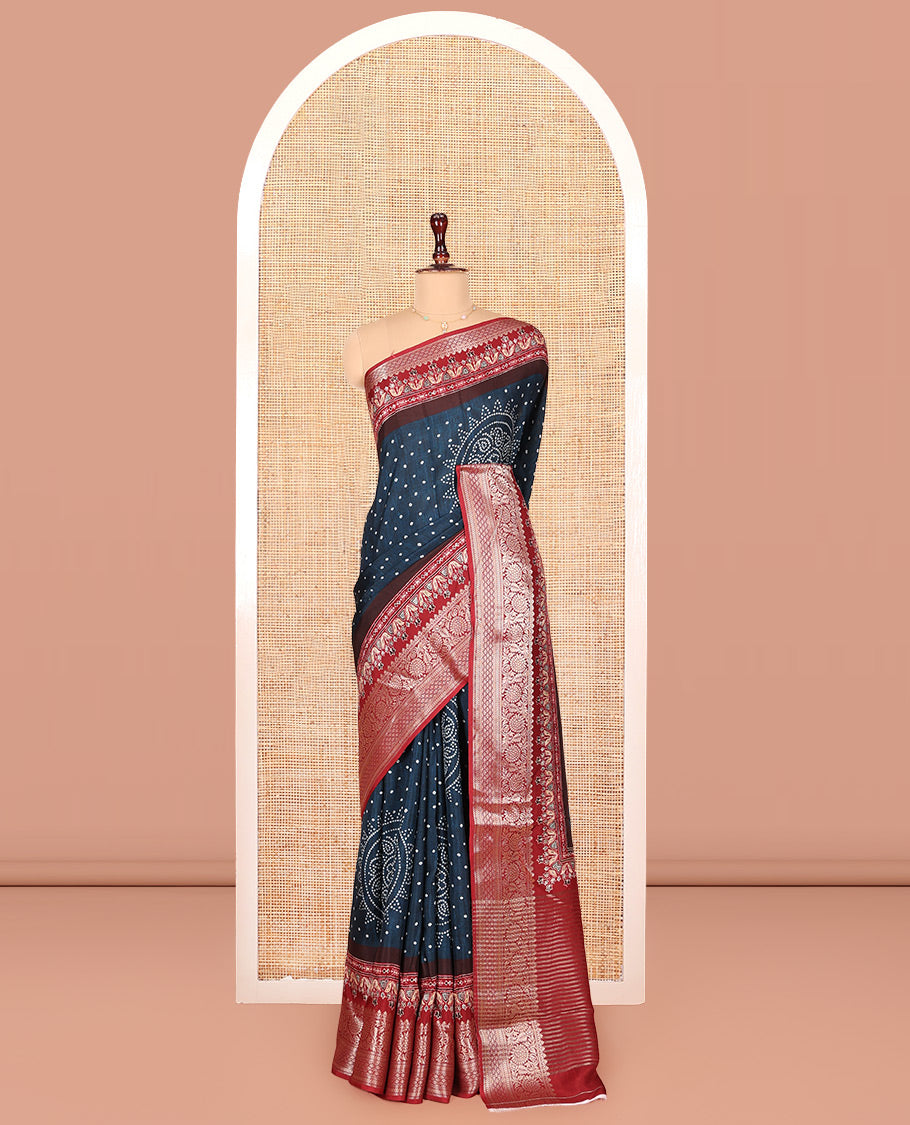 Blue Dola Silk Saree, Detailed with Bandhani Dots on Its Body, Complemented by Contrast Border, Zari Striped  Pallu, and Paired with a Contrast Blouse