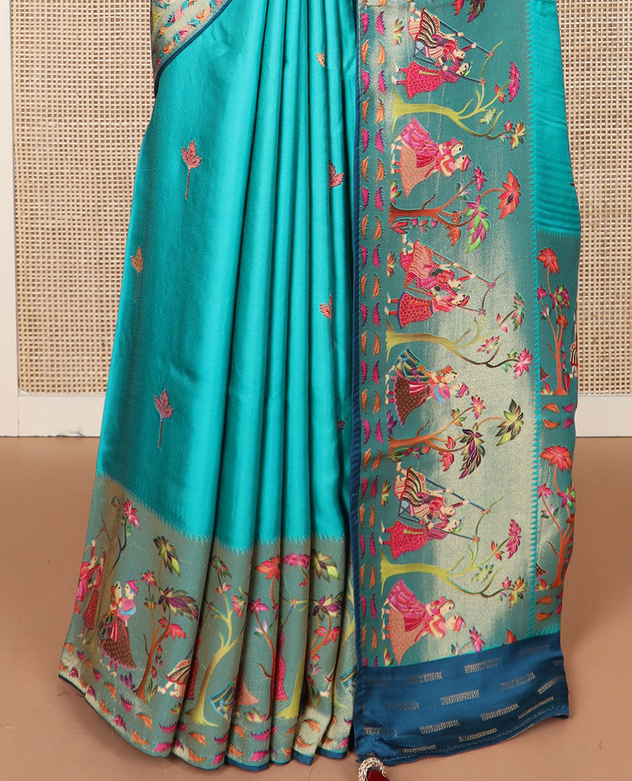 Blue unique motifs printed dola silk saree, gleaming zari border, and pallu of Mughal-style man and women motifs