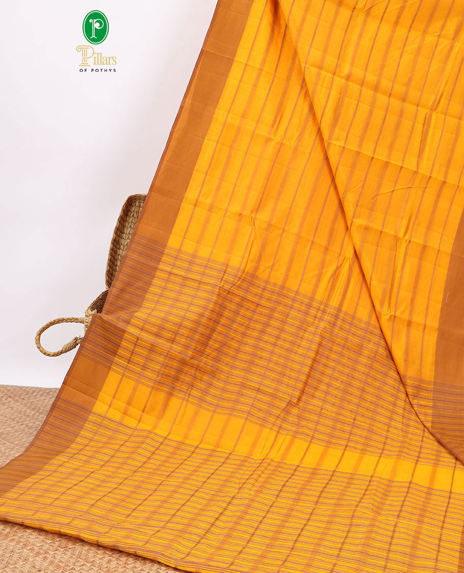 Yellow striped semi-banaras tussar saree with contrast border & checked pallu