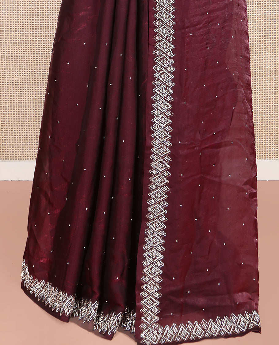 Maroon Designer Saree, Embellished with Stone Struck on Its Body, Highlighted by a Stone Embroidered Border, Self-Pallu, and Paired with a Matching Blouse