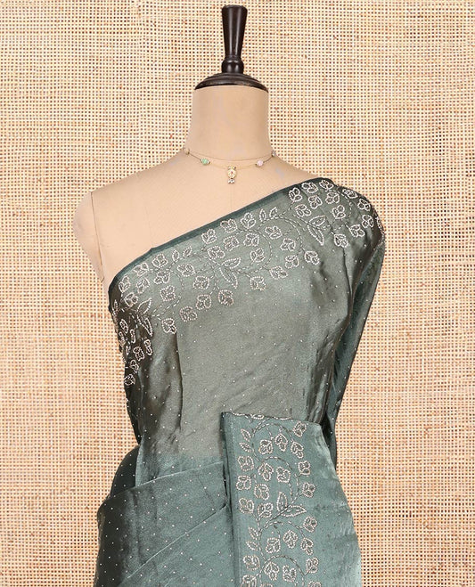 Grey Designer Saree, Enthralled with Stone Work All Over Its Body, a Scallop Floral Embroidered Border, and Matching Blouse