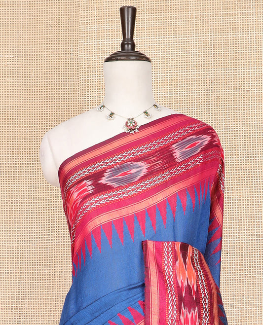 Blue Plain Dupion Silk Saree, Embellished with a Contrast Temple Border of Geometric Patterns and Ikkat Weave, Pallu Depicting Floral Ikkat Designs, and Paired with a Contrast Blouse