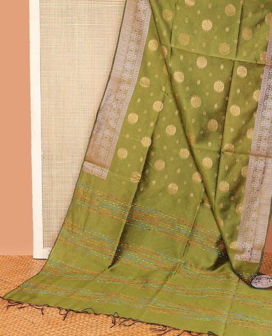 Green chakram buttas dupion saree, intricately designed border, and thread striped pallu