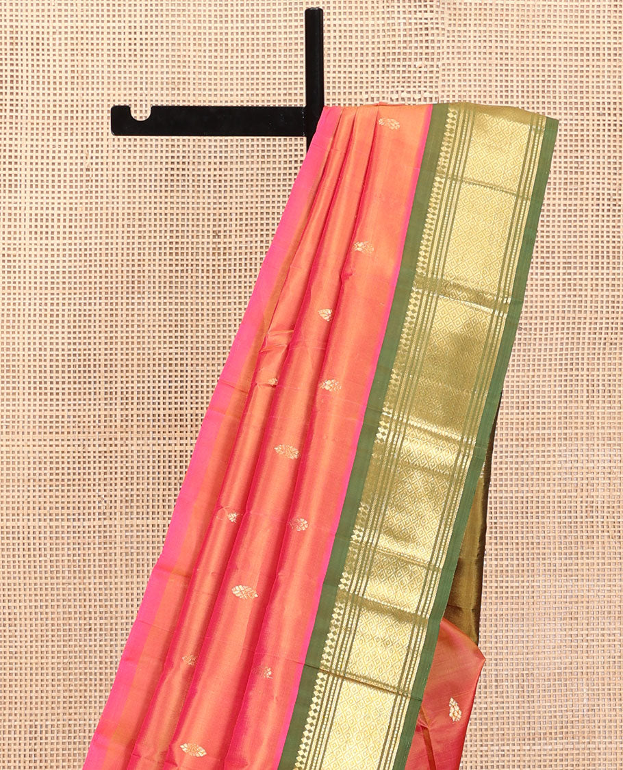 Orange Kanchipuram Silk Saree, Embellished with Zari Buttas, a Contrast One-Sided Border of Panner Sombu, Muthu, Bananras, and Mayil Kann, Zari Design Pallu, and No Blouse