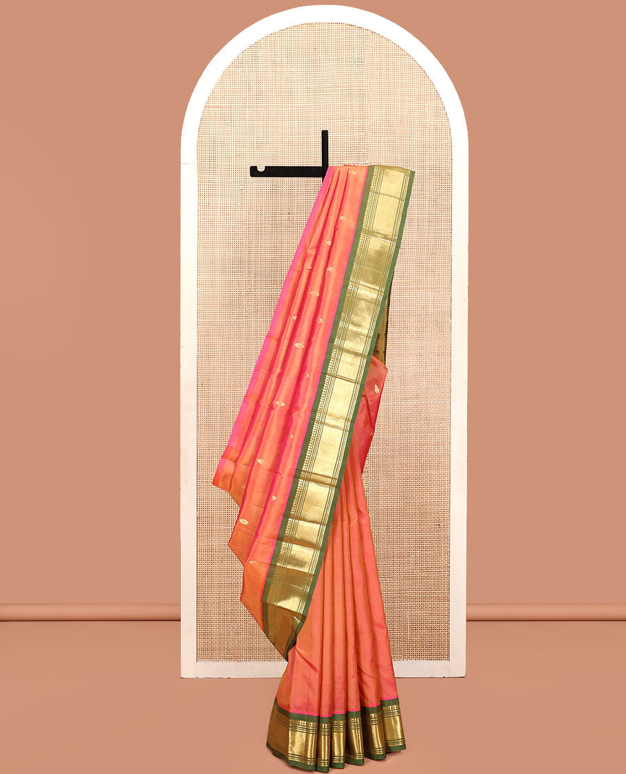 Orange Kanchipuram Silk Saree, Embellished with Zari Buttas, a Contrast One-Sided Border of Panner Sombu, Muthu, Bananras, and Mayil Kann, Zari Design Pallu, and No Blouse