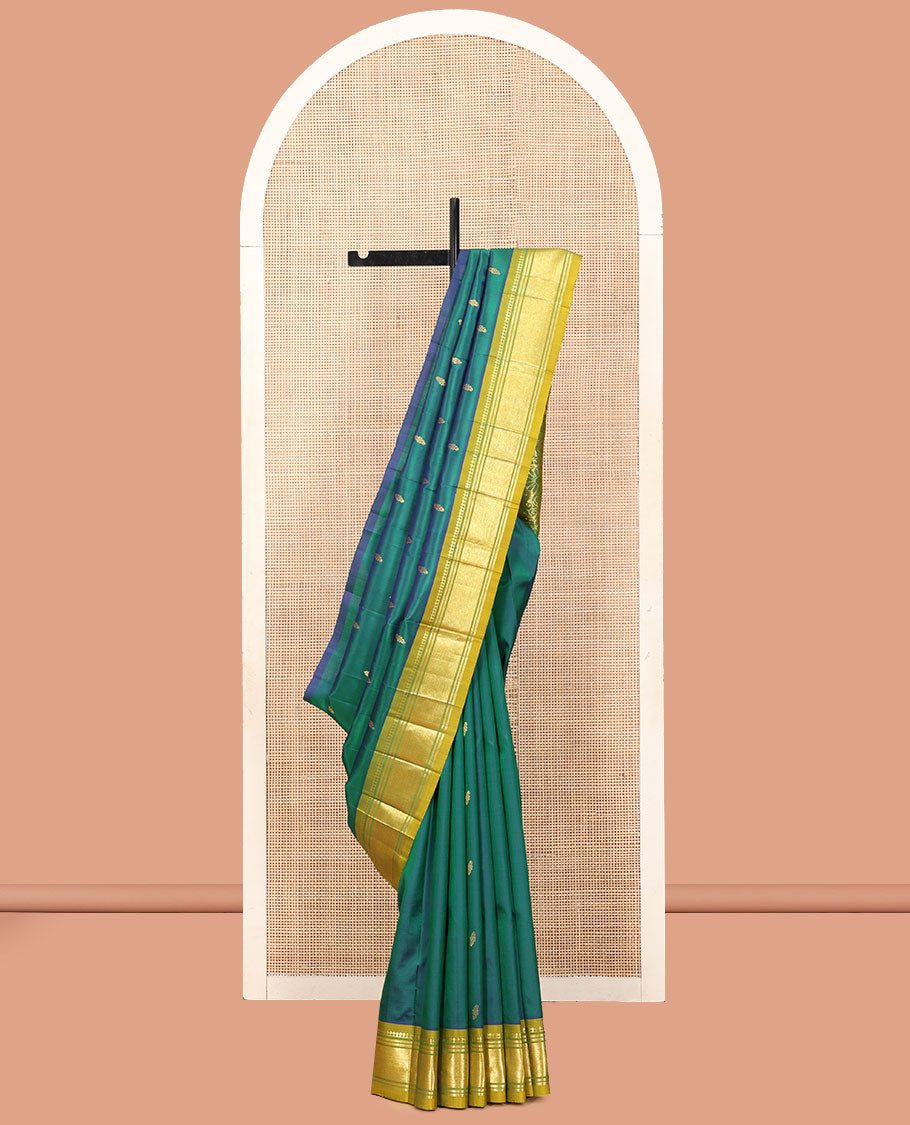 Green Kanchipuram Silk Saree, Detailed with Zari Buttas, a Contrast One-Sided Border of Panner Sombu, Banaras, and Jaal Designs, a Zari Design Pallu, and No Blouse
