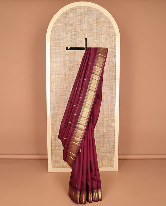 Maroon buttas kancheepuram silk saree with contrast intricate zari design border & floral zari design pallu
