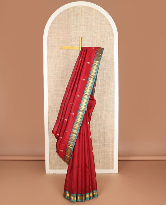 Red zari buttas kanchipuram silksaree, contrast one-sided border of thazampoo rekku & mayil kann design & zari design pallu