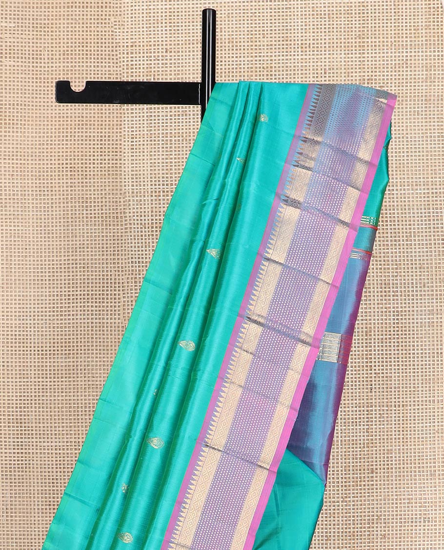 Blue zari buttas kanchipuram silk saree, contrast one-sided border of rekku,muthu & mayil kann & zari design pallu