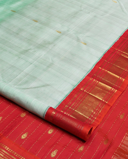 Light turquoise zari buttas Kanchipuram silk saree, contrast korvai border of  paneer sombu, banaras, muthu, and jaal design, and zari woven pallu