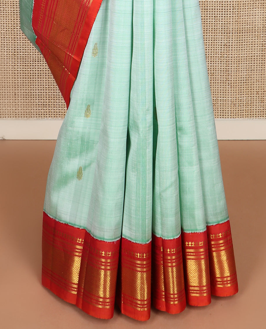 Light turquoise zari buttas Kanchipuram silk saree, contrast korvai border of  paneer sombu, banaras, muthu, and jaal design, and zari woven pallu