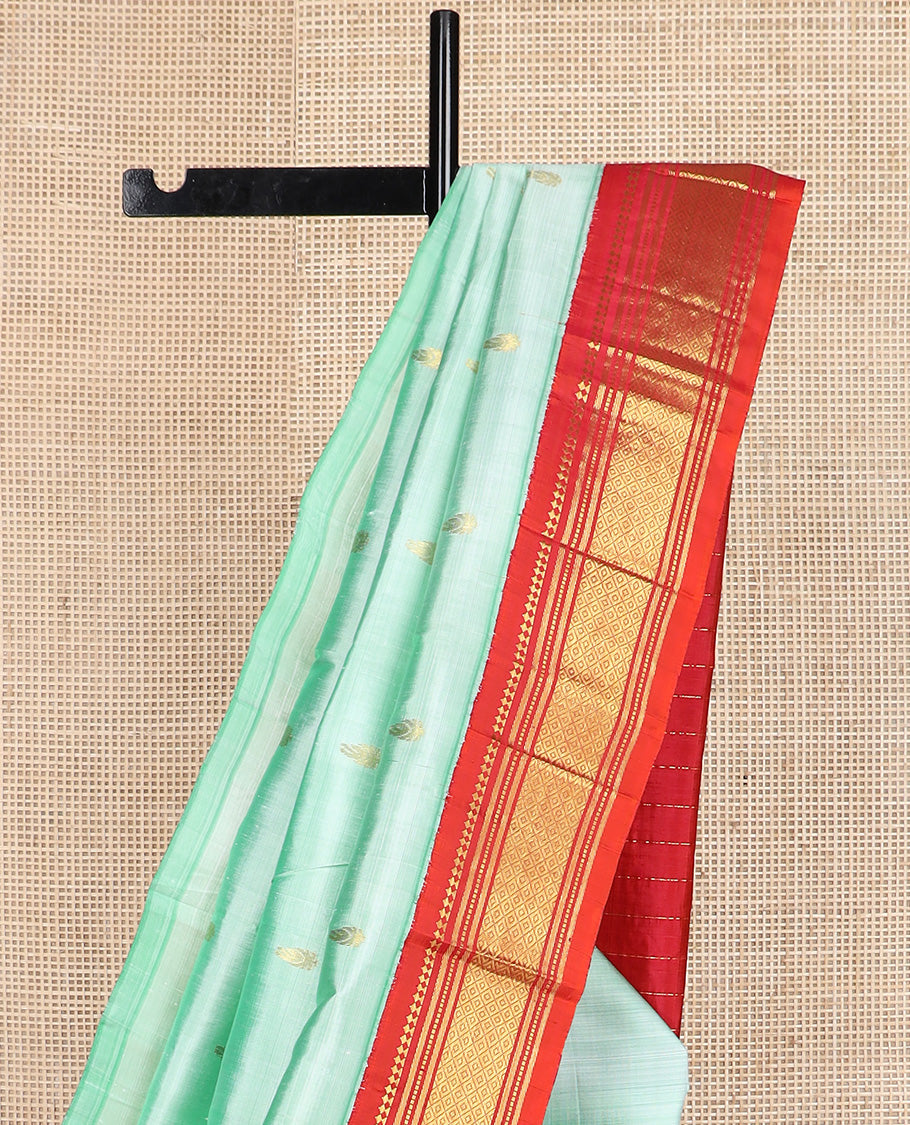 Light turquoise zari buttas Kanchipuram silk saree, contrast korvai border of  paneer sombu, banaras, muthu, and jaal design, and zari woven pallu