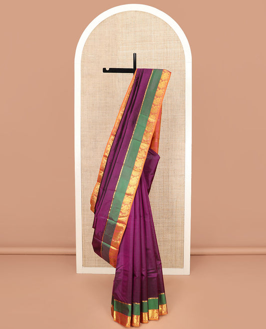 Purple Striped Kanchipuram Silk Saree Spotlighted with a Contrast Rettai Pettu Border Featuring Mayil Designs, a Subtle Striped Pallu, and a Contrast Blouse