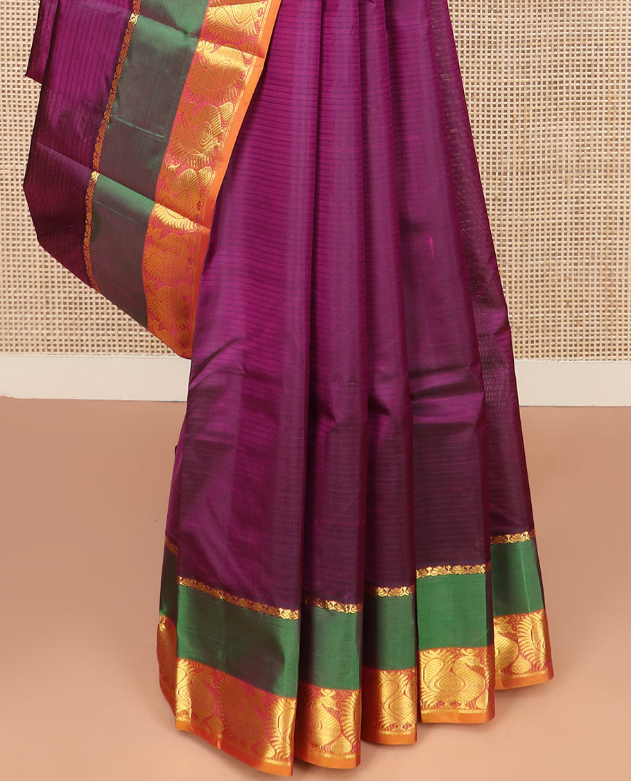 Purple Striped Kanchipuram Silk Saree Spotlighted with a Contrast Rettai Pettu Border Featuring Mayil Designs, a Subtle Striped Pallu, and a Contrast Blouse