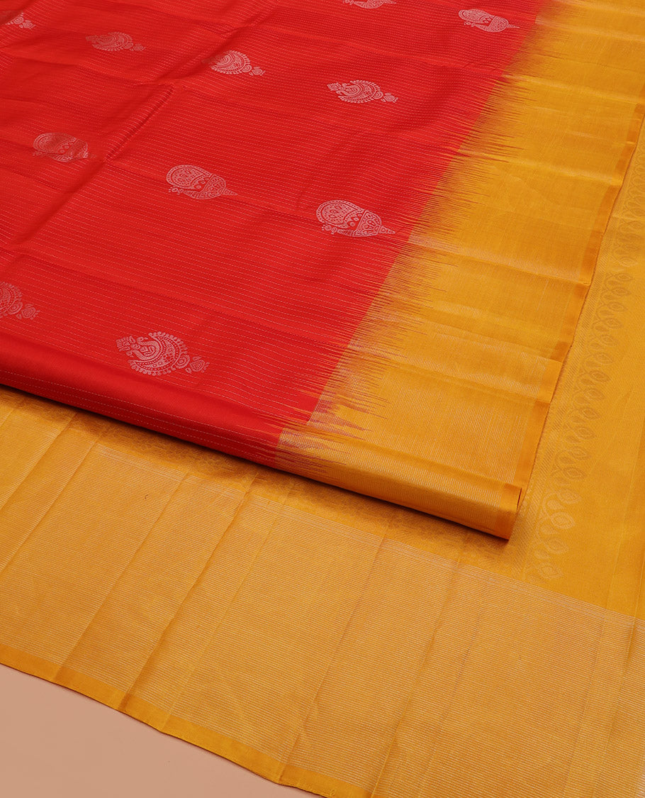 Red Kanchipuram Silk Saree Enriched with Zari Buttas on Its Body, Complemented by a Contrast Border, Captivating Pallu of Sparsely Woven Designs, and Paired with a Contrast Blouse