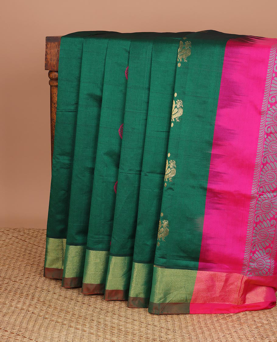 Green kuppadam silk saree with buttas, plain border & contrast pallu of intricate designs