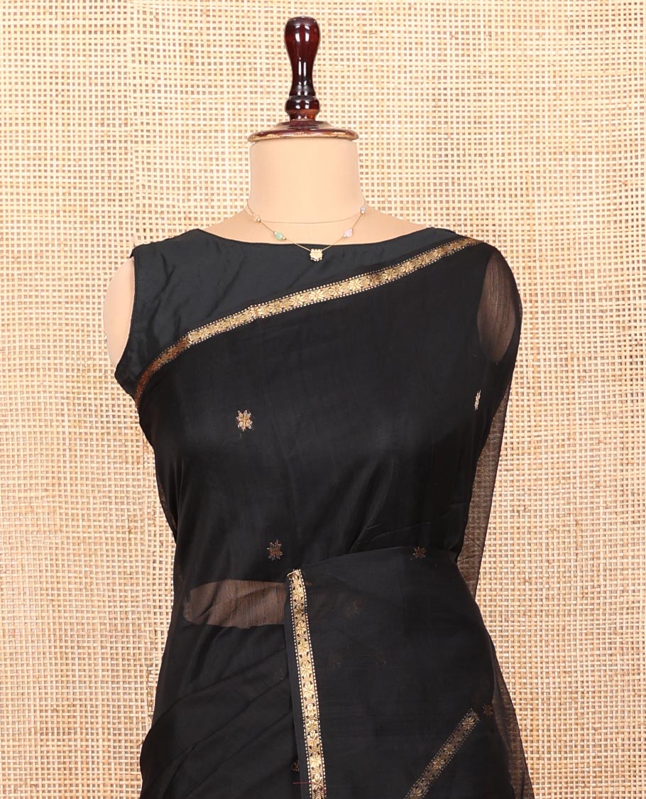 Black Maheshwari Cotton Saree, Accentuated with Star Motifs All Over Its Body, Highlighted by a Zari Piping Border, Complemented by a Contrast Pallu Steeped with Star Motifs, and Paired with a Contrast Blouse