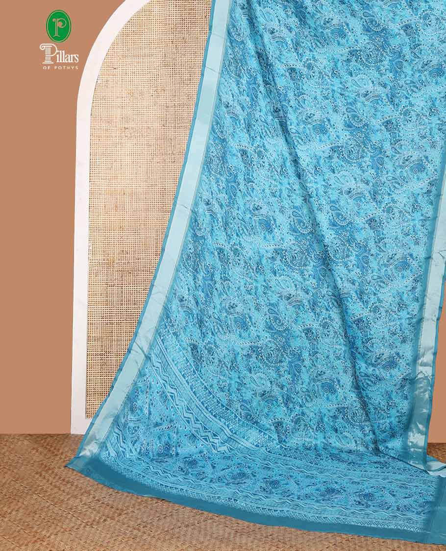 Blue mango design printed crepe viscose saree with bawanchi border & printed pallu along with negative printed blouse