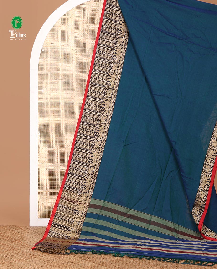 Blue plain masraise cotton saree, contrast border of elephant, peacock & geometric design & lining seer pallu