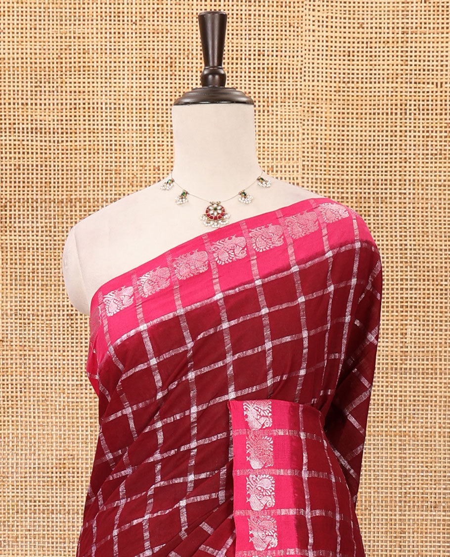 Maroon zari checked sungudi cotton saree, contrast pink border of zari peacock motifs & checked peacock motif pink blouse