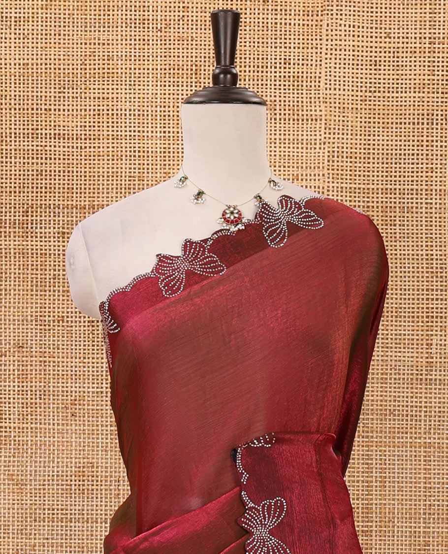 Maroon full-plain Fendi chiffon saree, scallop butterfly-style Swarovski stone work border & stone work matching blouse