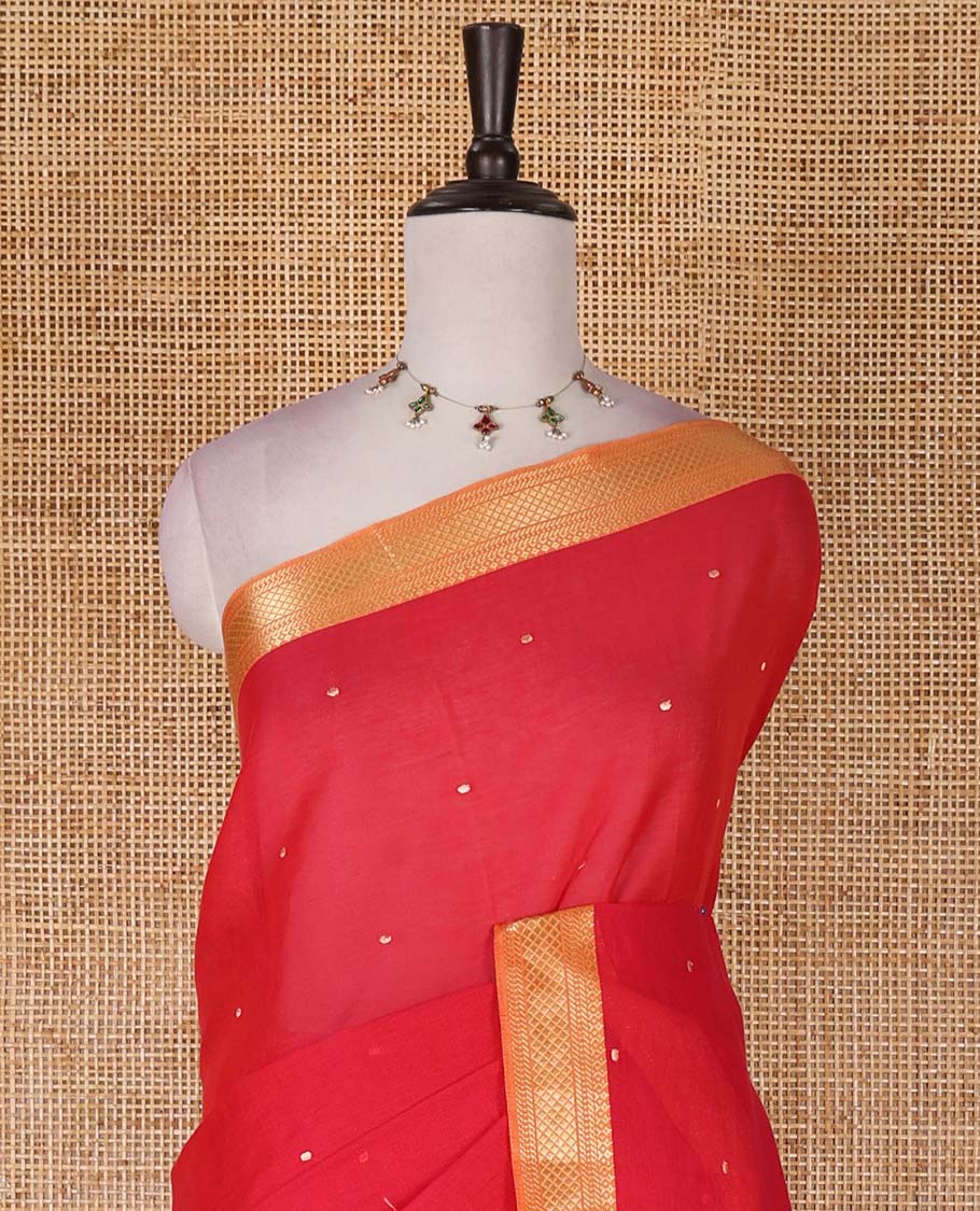 Rani pink buttas Mangalagiri cotton saree, contrast traditional zari border, floral vine with bird embroidered pallu, and matching blouse