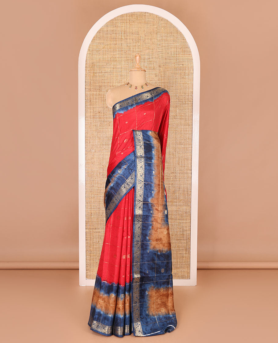 Red buttas enclosed checked dola silk saree, contrast shibori print with traditional zari border, buttas enclosed checked pallu, and a contrast buttas enclosed checked blouse