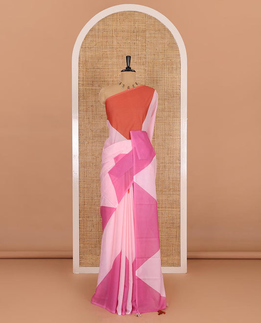 Borderless peach plain moss chiffon saree, contrast double-sided temple border, self-pallu, and diamond-patterned printed blouse