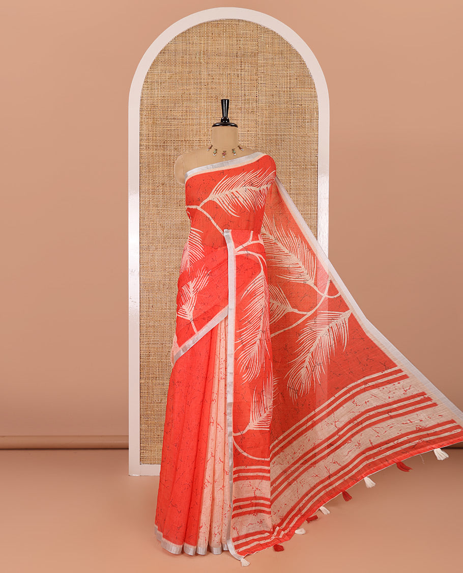 Peach tropical leaf motifs batik printed linen cotton saree, piping border, batik printed pallu and a contrast batik printed blouse