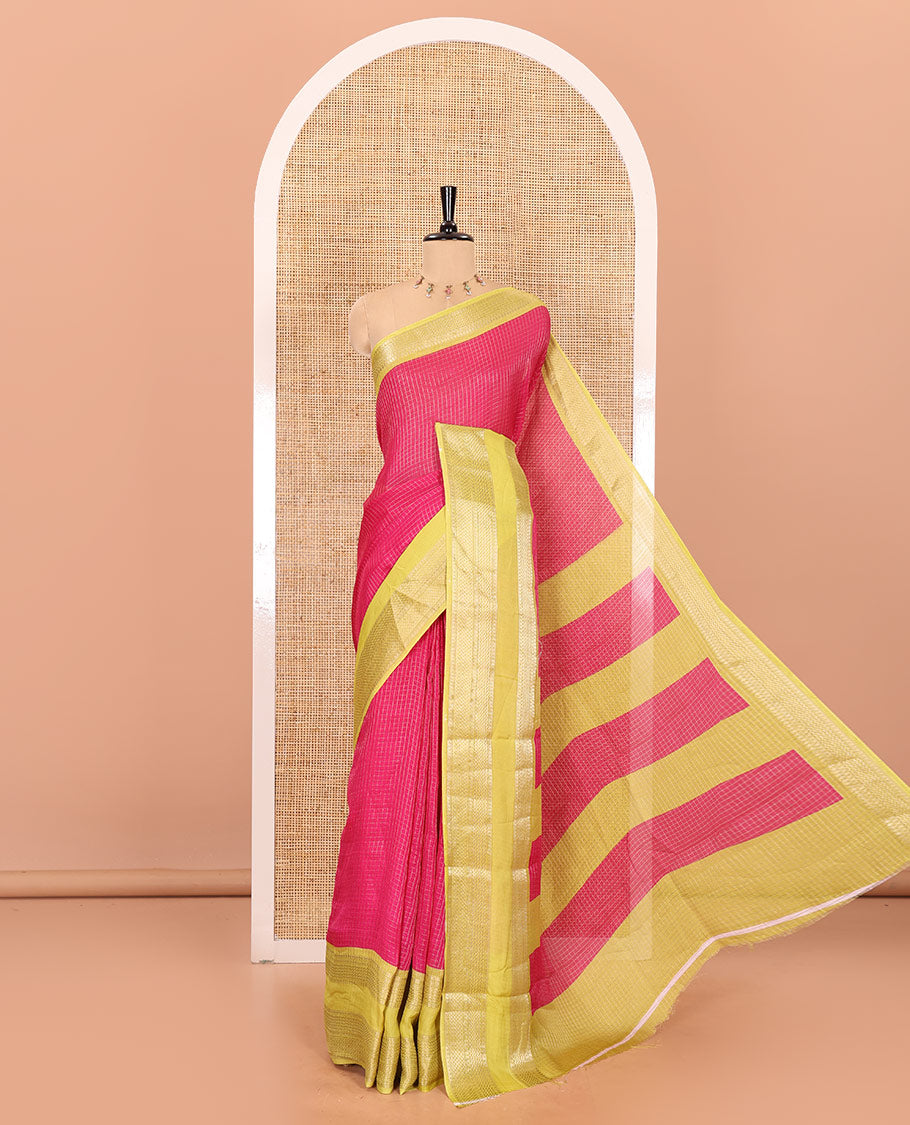 Rani pink checked moss chiffon saree with contrast traditional zari design border, checked pallu, and a contrast zari design blouse