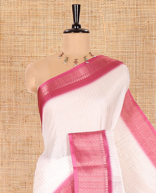 White and Pink Dola Silk Saree Bedecked with Vertical Zari Stripes All Over the Body, Complemented by a Contrast Border of Traditional Zari Designs, Self-Pallu of Stripes, and Paired with a Contrast Blouse