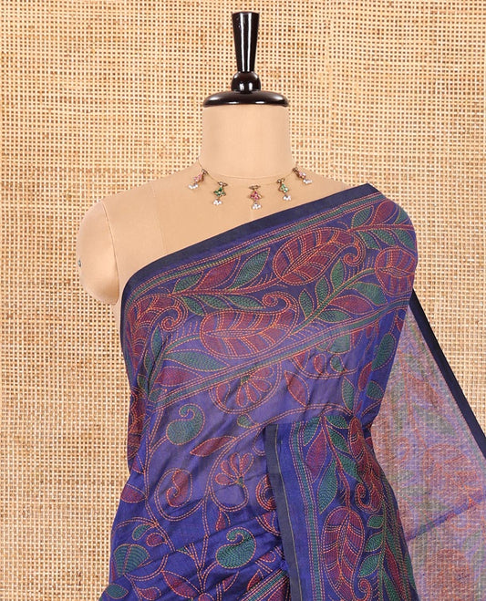 Blue Khadi Cotton Saree Beautifully Bedecked with Kalamkari-Style Paisley-Floral Prints, Subtly Sparkled with Self-Border of Floral Creeper Designs, Complemented by Contrast Paisley-Floral Vine Pallu, and Paired with a Contrast Printed Blouse