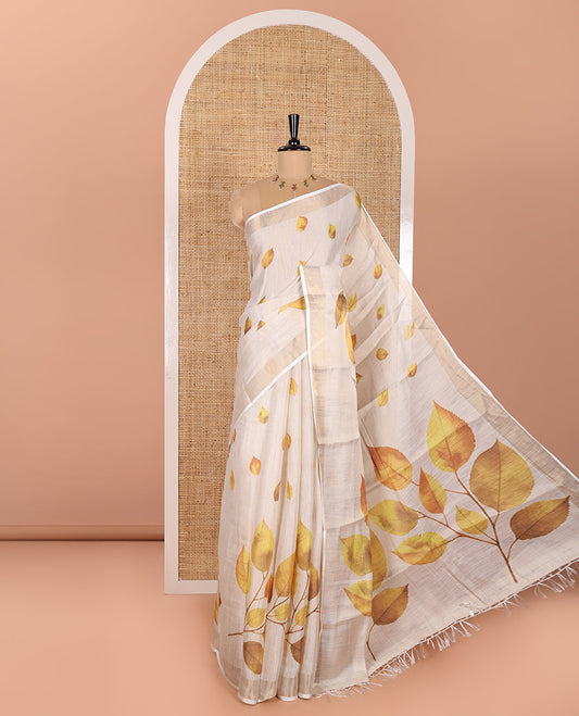 Cream Tissue Saree, Adorned with Dried Leaf Motifs Printed All Over Its Body, Subtle Bavanji Border, Pallu Features a Leaf Print, and Paired with a Matching Dried Leaf Printed Blouse