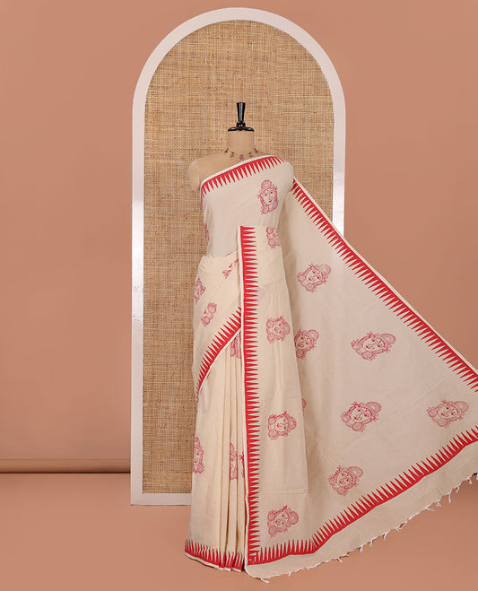 Cream South Cotton Saree, Elevated with Kalamkari-Style Figurine Motifs, Block Printed on  Its Body, Highlighted by Temple Printed Border, Comes with a Matching Blouse, and a Captivating Contrast Floral Vine Printed Blouse