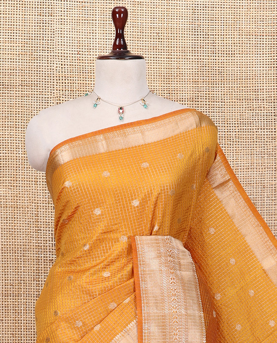 Mustard Semi-Tussar Saree, Enriched with Zari Buttas and Checks, a Traditional Zari Border, and a Matching Blouse