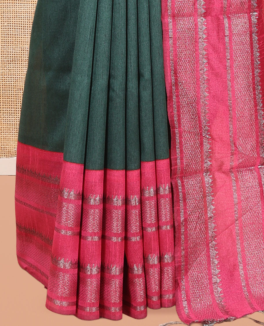 Bottle Green Plain Semi-Raw Silk Saree, a Contrast Silver Zari Border, a Contrast Pallu, and a Contrast Blouse